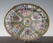 A Chinese Canton-decorated famille rose oval dish, 19th century, painted with panels of figures amid