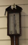 A Regency strung mahogany stick barometer, with silvered scale signed Jas. Gatty, 132 Holborn,