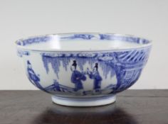 A Chinese blue and white bowl, Yongzheng mark and of the period (1723-35), painted with two ladies