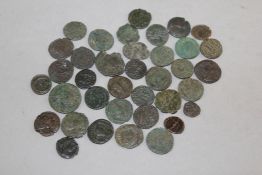 A collection of thirty eight Roman bronze coins, 2nd-3rd century A.D., varying design, largest 0.