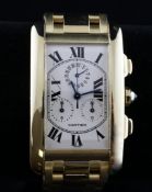 A gentleman`s 2006 18ct gold Cartier Tank Americaine chronograph quartz wrist watch, with Roman dial