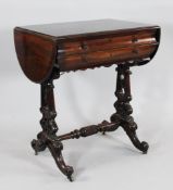 A Victorian mahogany Pembroke work table, fitted a pair of cushion shaped frieze drawers, on pierced