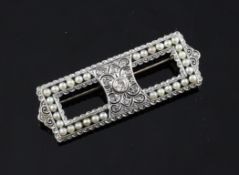 An Edwardian Belle Epoque white gold, diamond and seed pearl set brooch, of rectangular form, with