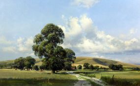 § Frank Wootton (1911-1978)oil on canvas,`The South Downs in Summer`,signed, titled and dated 1987