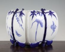 A Royal Worcester aesthetic style jardiniere, of square bulbous form moulded with bamboo shoots