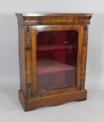 A Victorian walnut and inlaid gilt mounted pier cabinet, with single glazed door, W.2ft 7in.