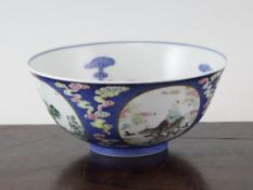 A Chinese famille rose blue ground medallion bowl, Daoguang seal mark and of the period, the