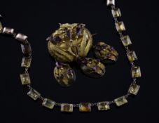 A Victorian gold and foil backed citrine necklace set with twenty three rectangular cut stones,