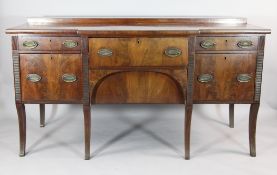 A Regency mahogany breakfront secretaire sideboard, with four drawers, cellaret drawer and a