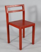 A Komplot `Non` design red rubber chair, by Boris Berlin & Poul Christiansen for Kallemo Ab.