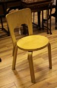 An Alvar Aalto birch and plywood chair, with circular seat, 30in.