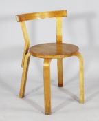 An Alvar Aalto birchwood stool, with raised back, 26.5in.