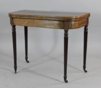 A George III mahogany and boxwood banded card table, on turned and fluted tapered legs, 2ft 5in. x