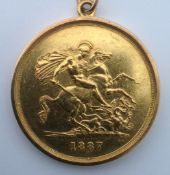A Victorian gold £5, 1887, mounted as a pendant, gross 46g.