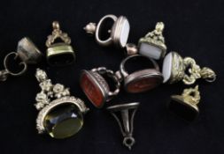 Ten assorted antique gilt metal and carnelian or quartz fob seals.