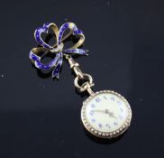 An Edwardian diamond and seed pearl set blue enamelled gold fob watch, 2.75in.