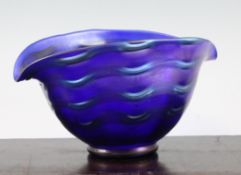 A Loetz iridescent blue glass bowl, 1930`s, of boat shape with a lip to each end, with silver / blue