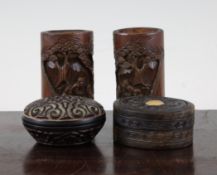 Two Chinese bamboo brush pots and two boxes, the brush pots typically carved in relief with sages