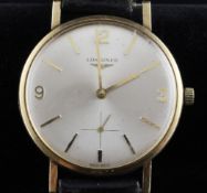 A gentleman`s early 1970`s 9ct gold Longines wrist watch, with baton and quarterly Arabic