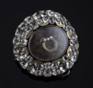 A George III paste set brooch, with central hairwork panel, 1.75in.
