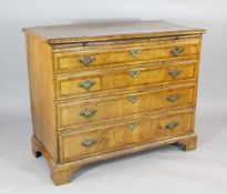 A George I walnut chest, with brush slide and four long drawers on bracket feet, 2ft 7.5in. x 3ft