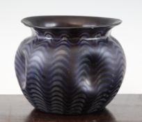 A Loetz Rubin vase, possibly a Phanomen Genre with silver iridescent wavy banded decoration to the