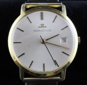 A gentleman`s 18ct gold Jaeger le Coultre wrist watch, with baton numerals, date aperture and case
