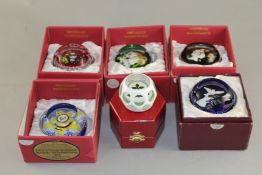 Six Perthshire Christmas limited edition glass paperweights, 1978 and 1991-1995, each decorated with