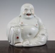 A Chinese seated figure of Budai, Republic period, holding a rosary of beads in his right hand,