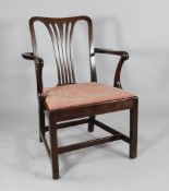 A George III mahogany dining chair, with scroll end arms and drop in seat on chamfered legs