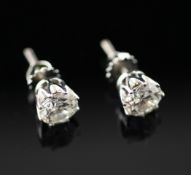 A pair of 18ct white gold set diamond ear studs, total estimated weight in excess of 2.5ct.
