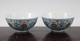 A pair of Chinese doucai bowls, underglaze blue Daoguang seal marks and probably of the period (