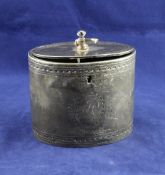 A George III bright cut engraved silver oval tea caddy, with engraved initials and figural knop, Ed.