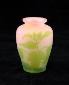 A Galle cameo etched small glass vase, c.1900, decorated with lime green flowers and leaves on a