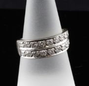 A 1970`s 18ct white gold double row diamond dress ring, with two rows of nine brilliant cut