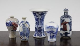 A Chinese blue and white miniature beaker vase and four Chinese porcelain snuff bottles, 20th