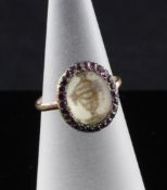 A George III gold memorial ring, with central inked ivory plaque depicting an urn within a band of
