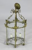 A Regency style brass and glazed hall lantern, of hexagonal form, 1ft 8in. x 10.5in.