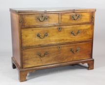 A George III and later rosewood crossbanded mahogany bachelor`s chest, one drawer stamped from W.