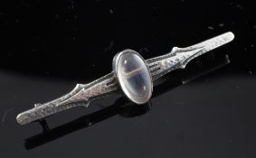 A stylish planished silver and moonstone set bar brooch, by Liberty, stamped "Liberty Sterling", 2.