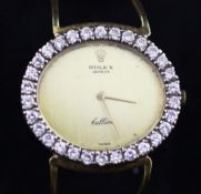 A lady`s 1980`s 18ct gold and diamond set Rolex Cellini wrist watch, with blind oval dial and