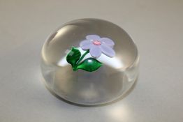 Two Baccarat paperweights and a St Louis paperweight, c.1990-92, the Baccarat with spaced millefiori