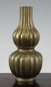 A Chinese bronze lobed double gourd vase, 19th century, four character seal mark beneath, 8in.