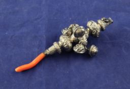 A late Victorian silver child`s rattle, whistle and teether, the baluster knop stem decorated with