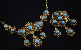 A gold and turquoise necklace and matching brooch, of foliate design, set with teardrop shaped