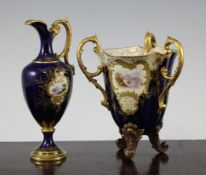 A Coalport three handled vase and a similar ewer, c.1900, both painted with landscape vignettes
