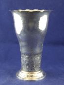 An early 20th century Swedish planished silver vase by C.G. Hallberg, of tapering form, with wavy