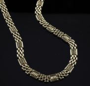 A modern 9ct gold box and brick link necklace, 16in, 31.5 grams.