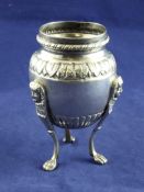 An early 19th century Swedish? silver vase, with fluted and leaf decoration, tripod paw supports