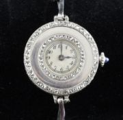 A lady`s early 20th century 18ct gold, platinum and diamond set cocktail watch, with Arabic dial and